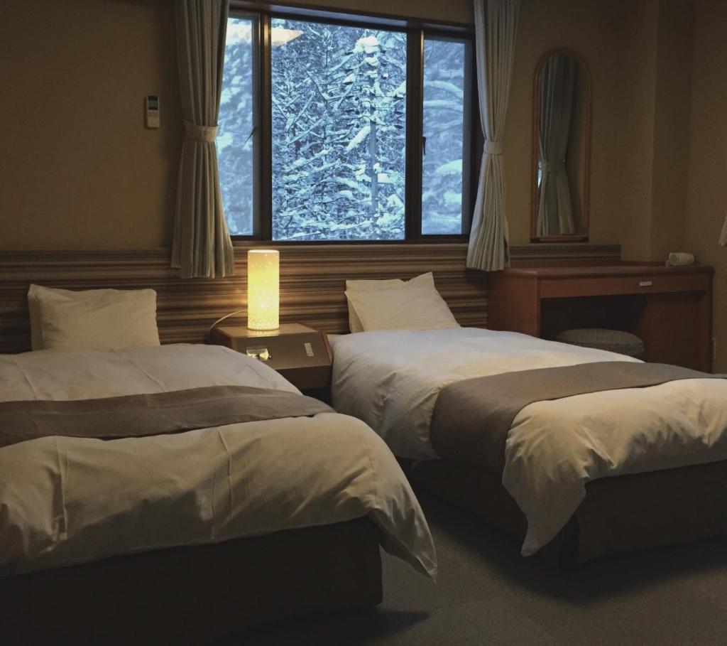 Hakuba Landmark Iwatake Lodge Bagian luar foto
